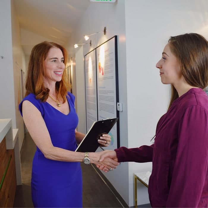 dr vikki greeting patient